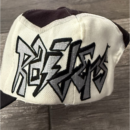 VTG DREW PEARSON RAIDERS JAGGED BOLT BLACK WHITE SILVER SNAPBACK HAT WOOL BLEND Yesterday's Fits Clothing Fashion Vintage Streetwear Fashion Item