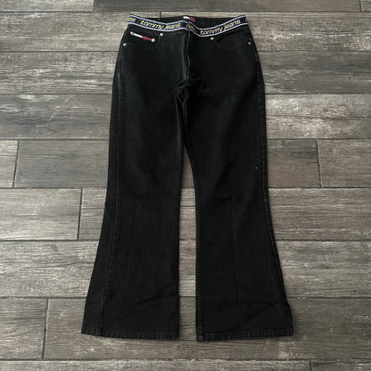 VTG TOMMY HILFIGER BLACK BOOT CUT JEANS REPEATING WAIST LOGO SZ WMNS 11 30X29 Yesterday's Fits Clothing Fashion Vintage Streetwear Fashion Item