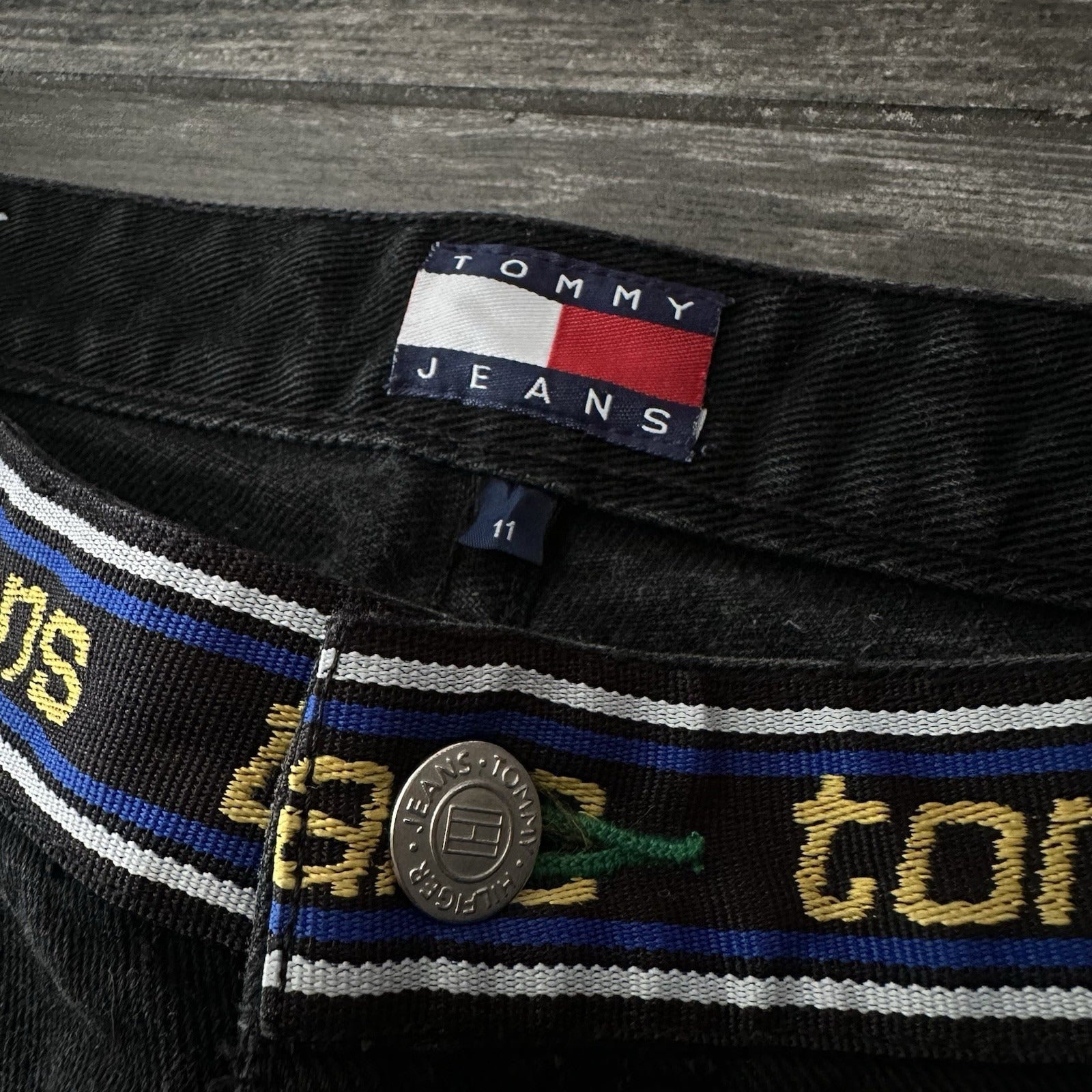 VTG TOMMY HILFIGER BLACK BOOT CUT JEANS REPEATING WAIST LOGO SZ WMNS 11 30X29 Yesterday's Fits Clothing Fashion Vintage Streetwear Fashion Item