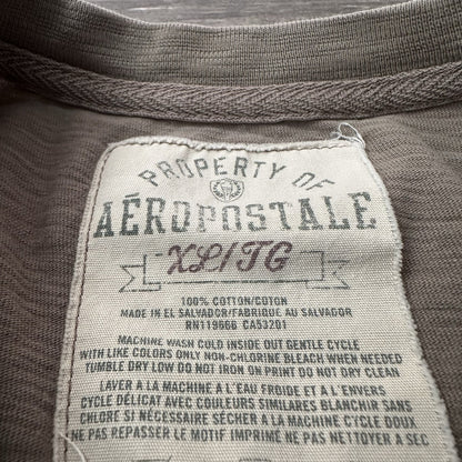 Y2K AEROPOSTALE KHAKI LONG SLEEVE SURF SKATE T-SHIRT SZ XL DISTRESSED SPELL OUT Yesterday's Fits Clothing Fashion Vintage Streetwear Fashion Item