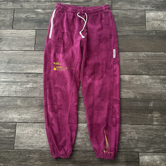 NIKE BASKETBALL STANDARD ISSUE PURPLE JOGGER TRAINING SWEATS SWEAT PANTS SZ M Yesterday's Fits Clothing Fashion Vintage Streetwear Fashion Item