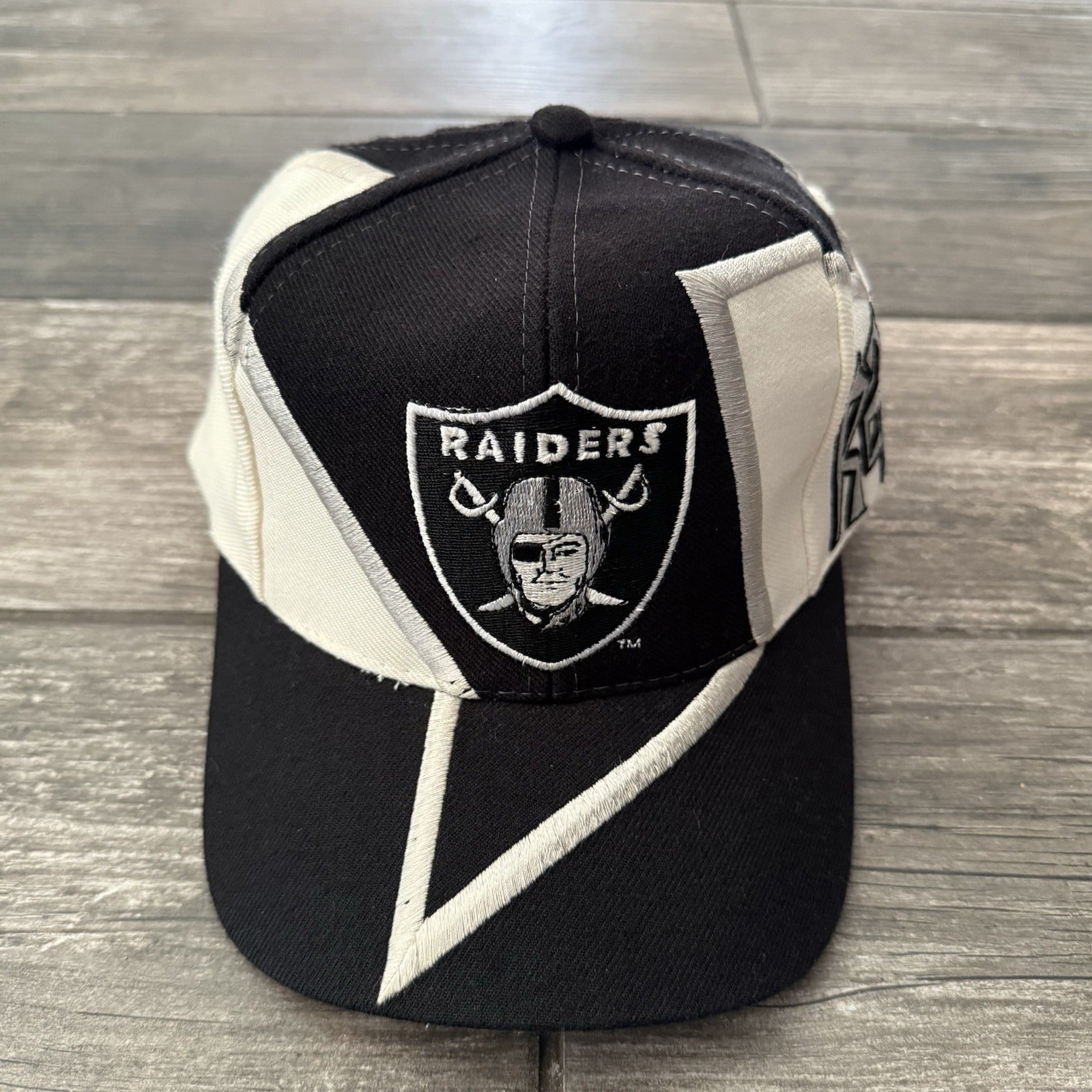 VTG DREW PEARSON RAIDERS JAGGED BOLT BLACK WHITE SILVER SNAPBACK HAT WOOL BLEND Yesterday's Fits Clothing Fashion Vintage Streetwear Fashion Item