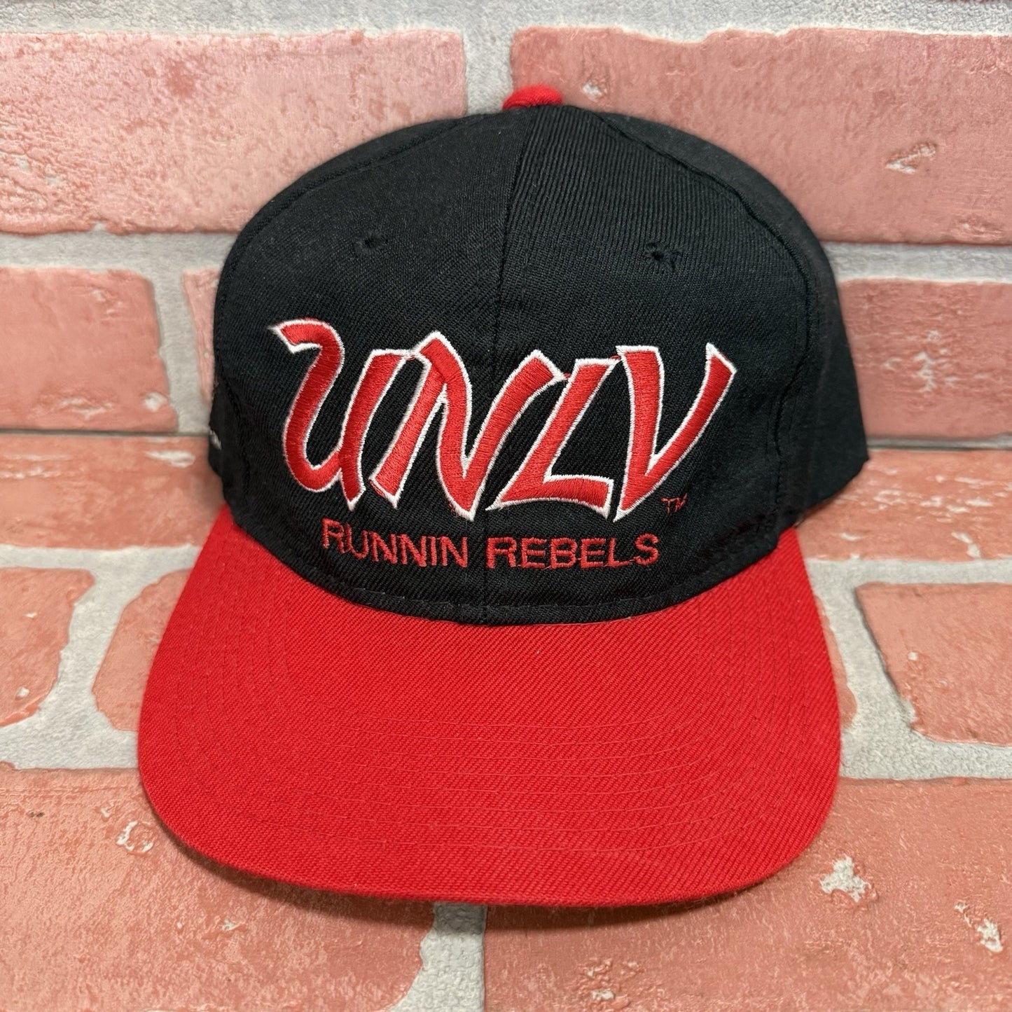 VTG SPORTS SPECIALTIES UNLV RUNNIN REBELS SCRIPT SNAPBACK RED BLACK DOME ADJUST Yesterday's Fits Clothing Fashion Vintage Streetwear Fashion Item