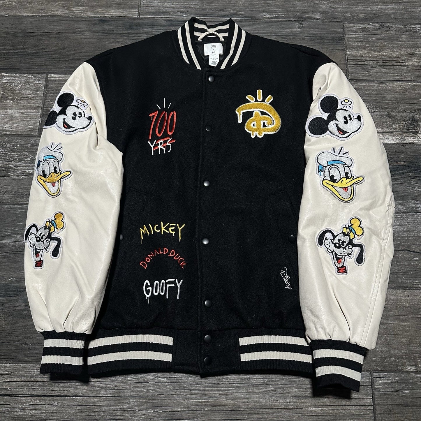 H&M DISNEY 100 YEARS OF WONDER VARISTY BOMBER JACKET M CHARACTERS BLACK WHITE Yesterday's Fits Clothing Fashion Vintage Streetwear Fashion Item