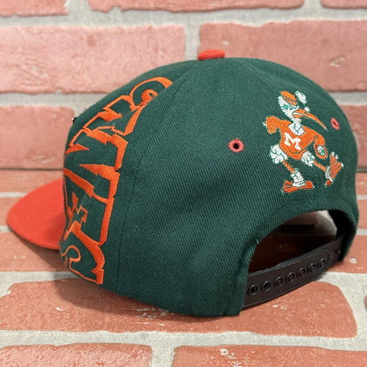 VTG 90s MIAMI HURRICANES METAL PLATE GREEN ORANGE SNAPBACK HAT MAGIC BY BEE Yesterday's Fits Clothing Fashion Vintage Streetwear Fashion Item